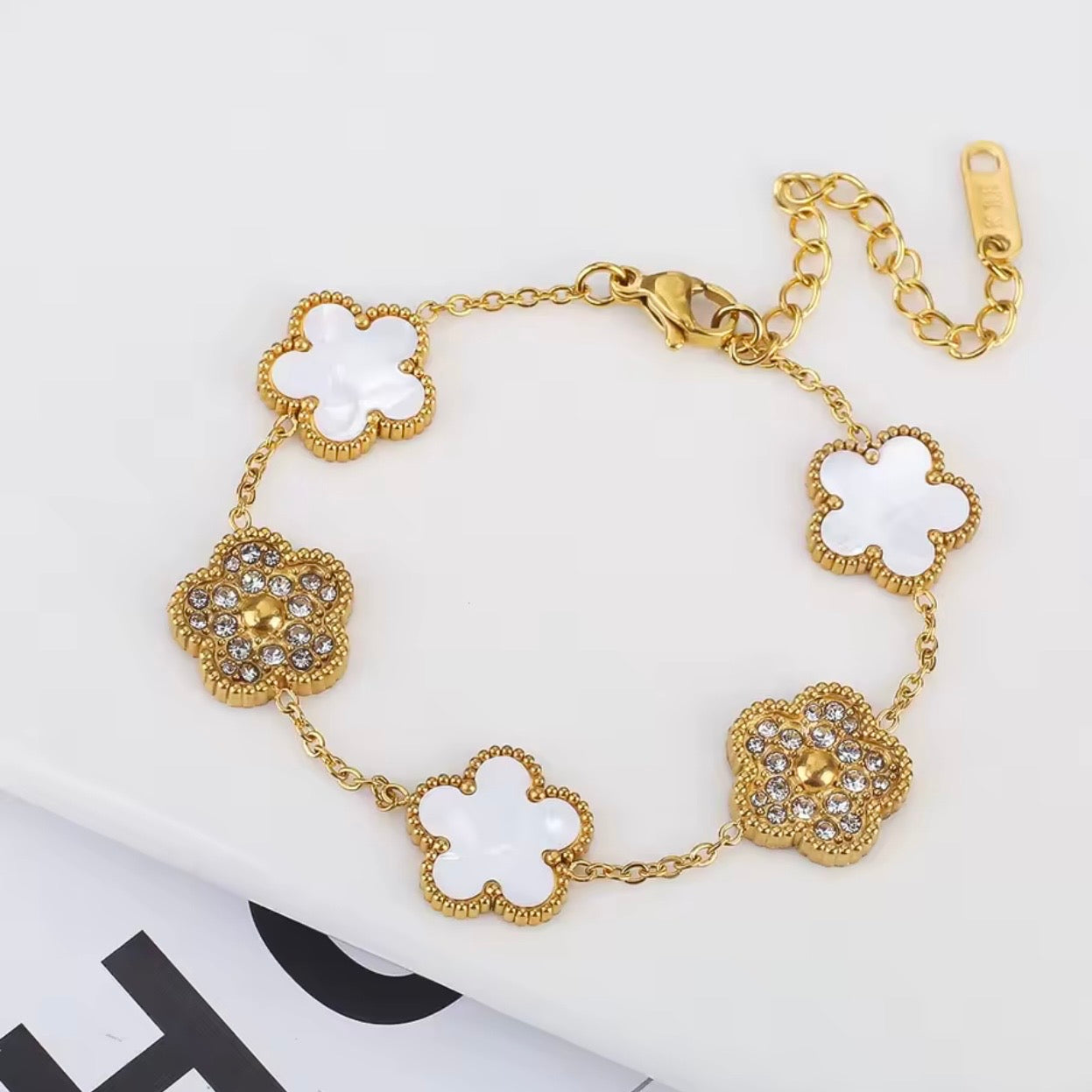 White Clover & Crystal Gold Bracelet – Elegant Charm Bracelet