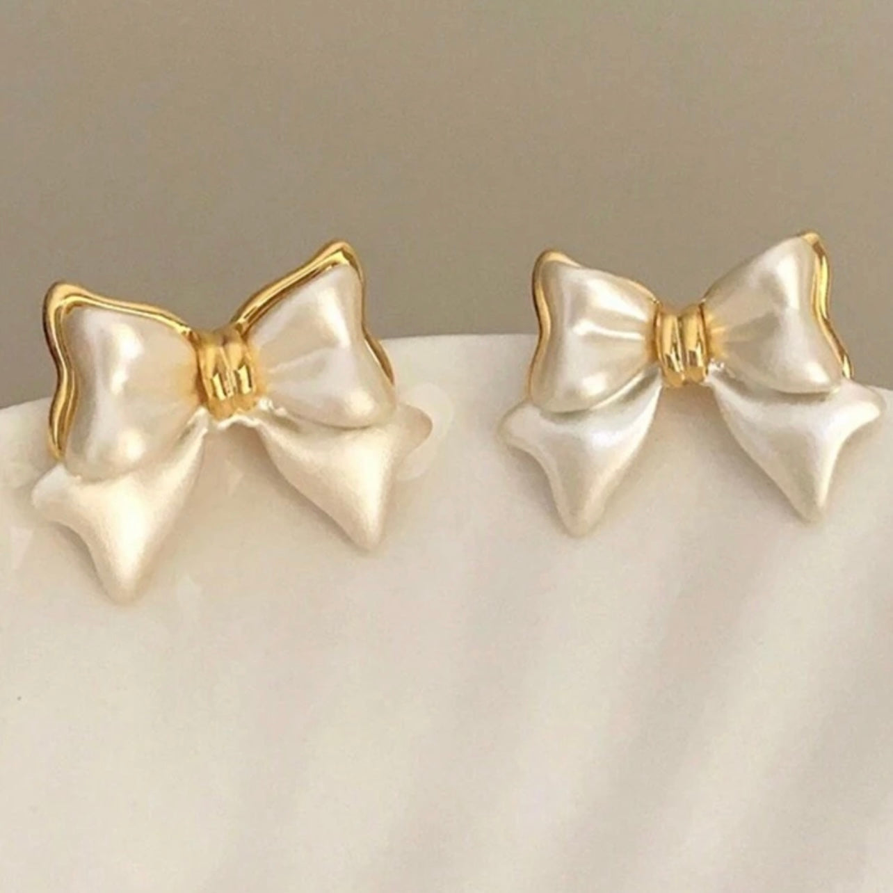 Pearl Bow Stud Earrings for Women – Elegant Gold-Trimmed Dainty Earrings