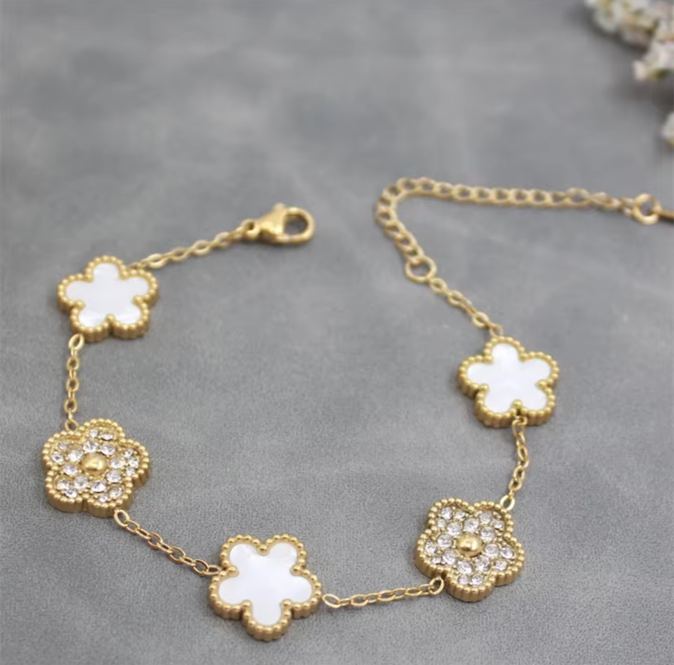 White Clover & Crystal Gold Bracelet – Elegant Charm Bracelet